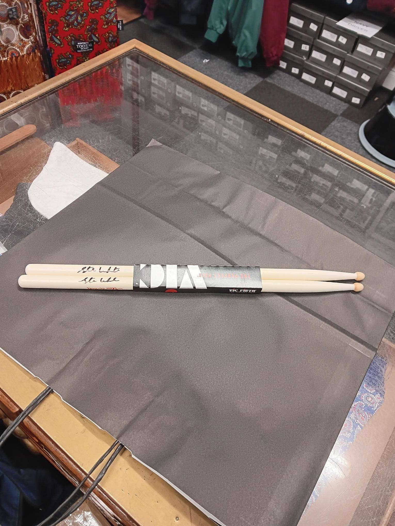 Drumsticks signed by Steve White